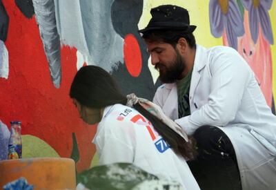 Group founder Taj Al DeenMali hopes his fellow artists can help heal Mosul's emotional wounds. Sinan Mahmoud for The National