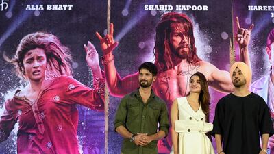 From left, Bollywood actors Shahid Kapoor, Alia Bhatt and Diljit Dosanjh attend a news conference for their upcoming film Udta Punjab in Mumbai on June 14, 2016. A top court told India's film censor board on June 13 not to act "like a grandmother" as it overturned a controversial demand by the notoriously strict body for 13 cuts to a film depicting drug addiction. PUNIT PARANJPE / AFP