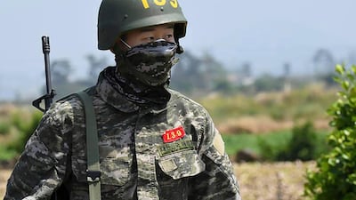 Son Heung-min marches alone during a drill at a Marine Corps boot camp in Seogwipo on Jeju Island.