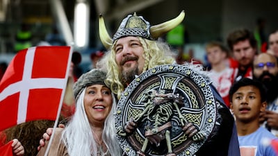 Denmark fans dressed as Vikings inside the stadium. Reuters