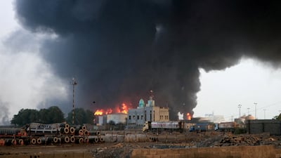 Flames and smoke rise from the site of Israeli air strikes at the port of Hodeidah, Yemen. Reuters