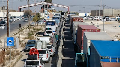 Vehicles wait to enter Syria from Jordan through the Jaber-Nassib border crossing in December 2024, after rebels toppled Bashar Al Assad. AFP