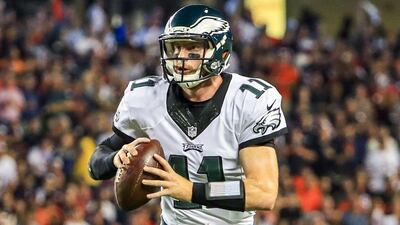Philadelphia Eagles quarterback Carson Wentz scrambles while looking to pass against the Chicago Bears last week. Tannen Maury / EPA