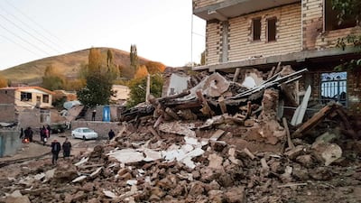 Debris of buildings in the Iranian village of Varnakesh. AFP