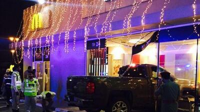 A Chevrolet Silverado crashed though the McDonald’s at an EPPCO petrol station in Ajman. Courtesy Ajman Police