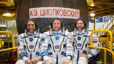 Nasa astronaut Frank Rubio, left, and Russian cosmonauts Sergey Prokopyev, centre, and Dmitri Petelin at the Baikonur Cosmodrome in Kazakhstan on September 21, 2022. Photo: Nasa