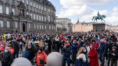 People attend a demonstration against the tightening of Denmark’s migration policy and the deportation orders in Copenhagen, Denmark. AP Photo/David Keyton