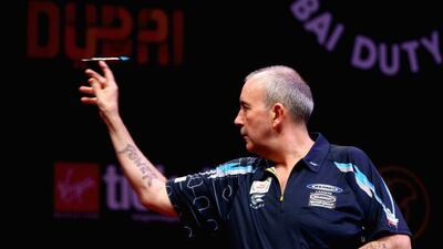 Phil Taylor in action during the final. Francois Nel / Getty