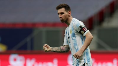Lionel Messi celebrates after scoring during the penalty shootout.
