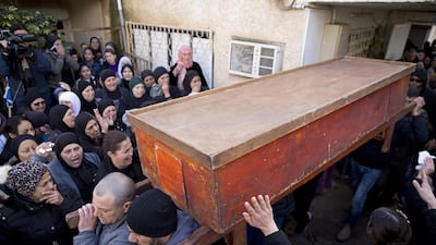 Palestinians carry the coffin of Layan Nasser during her funeral. Ariel Schalit/AP Photo