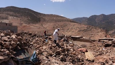 Villagers survey the rubble of destroyed buildings after the earthquake near Amizmiz, in El Haouz district. Bloomberg