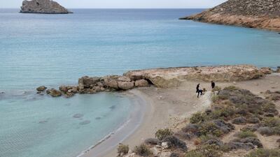 Police cordon off part of a beach due to falling rocks in Xerokampos village after a strong earthquake shook Crete island. EPA