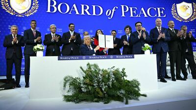 US President Donald Trump, centre, launches his Gaza Board of Peace in Davos alongside world leaders and senior officials. AFP