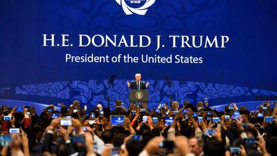 Donald Trump addresses the APEC CEO summit in Vietnam, but his remarks on Russian intervention in the 2016 elections have made the headlines at home. AFP/Jim Watson