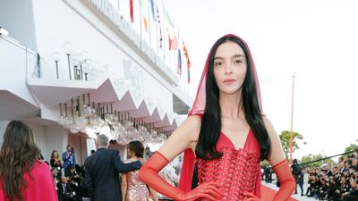 Model Mariacarla Boscono wears Dolce & Gabbana