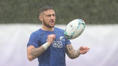 All Blacks' TJ Perenara, like others, had to contend with inclement weather. Reuters