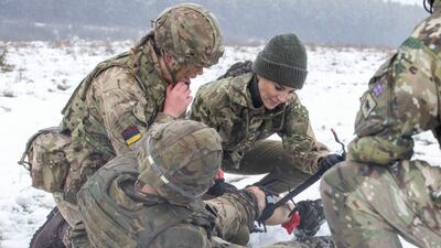 Catherine, Princess of Wales, assists in a military exercise on a royal visit to the Irish Guards on Salisbury Plain. Getty Images