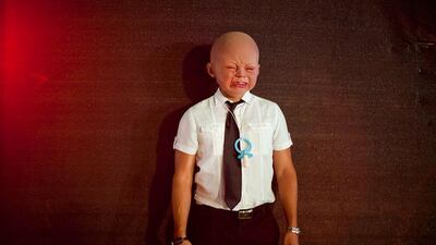 A party goer in costume poses for a photo during a halloween party at the Atlantis hotel on the Palm Jumeirah, Dubai.