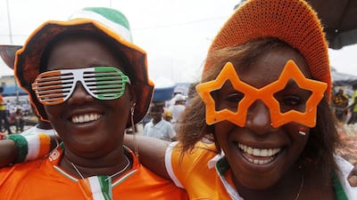 Ivory Coast fans prepare for their team's Africa Cup of Nations final against Ghana on Sunday in Abidjan, Ivory Coast. Luc Gnago / Reuters