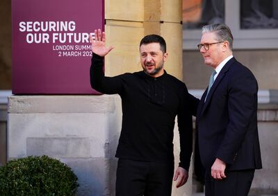 Ukrainian President Volodymyr Zelenskyy, left, is received by British Prime Minister Keir Starmer in London. AP
