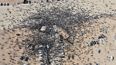 Mourners gather for the funeral of Saif Al Islam Qaddafi, the slain son of former Libyan leader Muammar Qaddafi, in Bani Walid, Libya. EPA