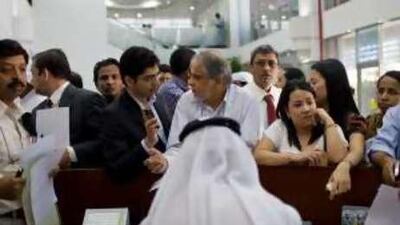 Expatriates swamp the Emirates Identity Authority at Dubai's Central Post Office as they try to register for identity cards.