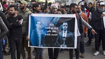 Iraqis take part in a rally to mourn two reporters (image) shot dead the previous evening in the country's southern city of Basra, where they had been covering months of anti-government protests on January 11, 2020. AFP