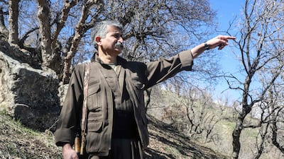 Mazlum Haftan, a commander in the Kurdish Iranian group Party of Free Life of Kurdistan (PJAK), near the Iraqi border with Iran in Iraq's northern autonomous Kurdish region on February 26, 2026. AFP