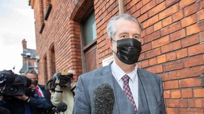 Edwin Poots, leader of the Democratic Unionist Party (DUP) leaves the party headquarters in Belfast on June 17, 2021. AFP