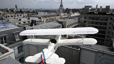 A scaled-down replica of the L’Oiseau Blanc biplane on the terrace of the restaurant and bar L'Oiseau Blanc of the the Peninsula Paris hotel. Benoit Tessier / Reuters