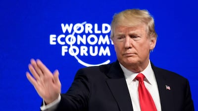 US President Donald Trump waves after delivering his speech at the World Economic Forum (WEF) annual meeting in Davos. Fabrice Coffrini / AFP Photo