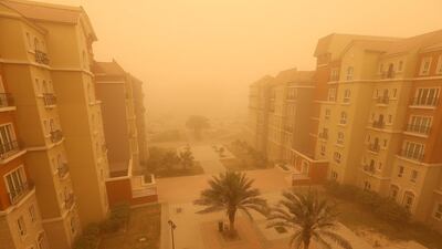 Dusty weather in Discovery Gardens in Dubai. Pawan Singh / The National