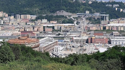 The demolition of the large towers '10' and '11' of the Morandi bridge using micro-explosive charges, in Genoa, northern Italy. EPA