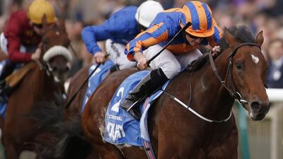 Ryan Moore riding Chruchill to win the Dewhurst Stakes at Newmarket on Saturday. Alan Crowhurst / Getty Images / October 8, 2016