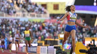 Sydney McLaughlin crosses the finish line to win the women's 4x400m relay final for the USA. AFP