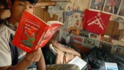 A former Maoist combatant Life of Revolutionaries during his free time at a camp outside Kathmandu.