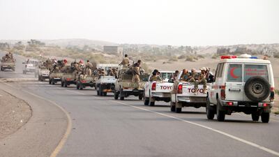 Yemeni forces backed by the Saudi-led coalition gather near the outskirts of the western port city of Hodeidah, Yemen, 12 June 2018. EPA/NAJEEB ALMAHBOOBI