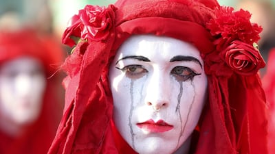 An activist takes part in a protest during Cop26 in Glasgow, Scotland, on November 6, 2021. Photo: Reuters