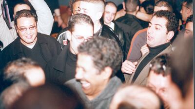 Khaled swarmed by fans during his show at New York's Beacon Theatre in 2002