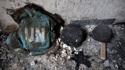 A UN flak jacket and helmets lie on the floor inside a destroyed guesthouse in Kabul, Afghanistan in 2009. Getty Images