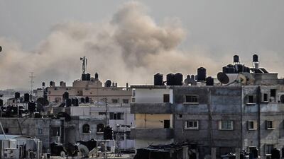 A picture taken on October 18, 2017, from Rafah in the southern Gaza Strip shows smoke billowing from Egypt's North Sinai. Said Khatib / AFP