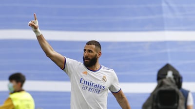 Striker Karim Benzema celebrates after scoring the fourth goal. EPA