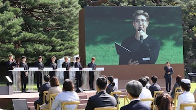 "Seven young people living lives like a roller coaster... I remember in 2018 all seven of us were lost after so much success. We can never believe the path will remain full of flowers and fruit, because we don't know when the descent will start again," said RM, leader of BTS. Yonhap via AP