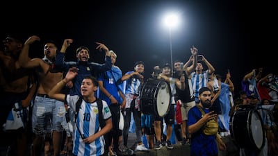 Fans gather outside of the Association of Argentinian Football Headquarters ahead of the team arrival. Reuters