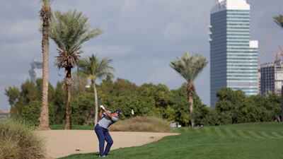Richard Bland plays his second shot on the 12th hole. Getty