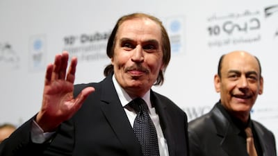 Egyptian actors Ezzat Al Alaili, left, and Ahmed Bdeir arrive for the opening ceremony of Dubai International Film Festival in Dubai on December 6, 2013. AFP
