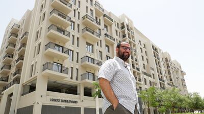 Mohamad Hussein rents a two-bedroom unit at the Town Square Hayat Boulevard Apartments in Dubai. All photos: Pawan Singh / The National