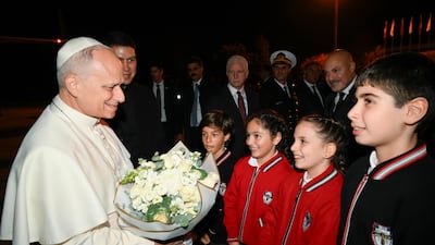 The Pope is greeted at Istanbul Ataturk Airport. EPA
