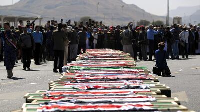 Supporters of the Houthi movement attend the funeral of those killed during recent clashes between Houthi rebel fighters and loyalists of Yemen's late ex-president Ali Abdullah Saleh, in Sanaa on December 7, 2017. Mohammed Huwais / AFP