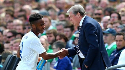 England manager Roy Hodgson, right, shakes hands with Raheem Sterling as he is substituted during an international friendly against Ireland at Aviva Stadium, Dublin, on June 6, 2015. Reuters / Eddie Keogh